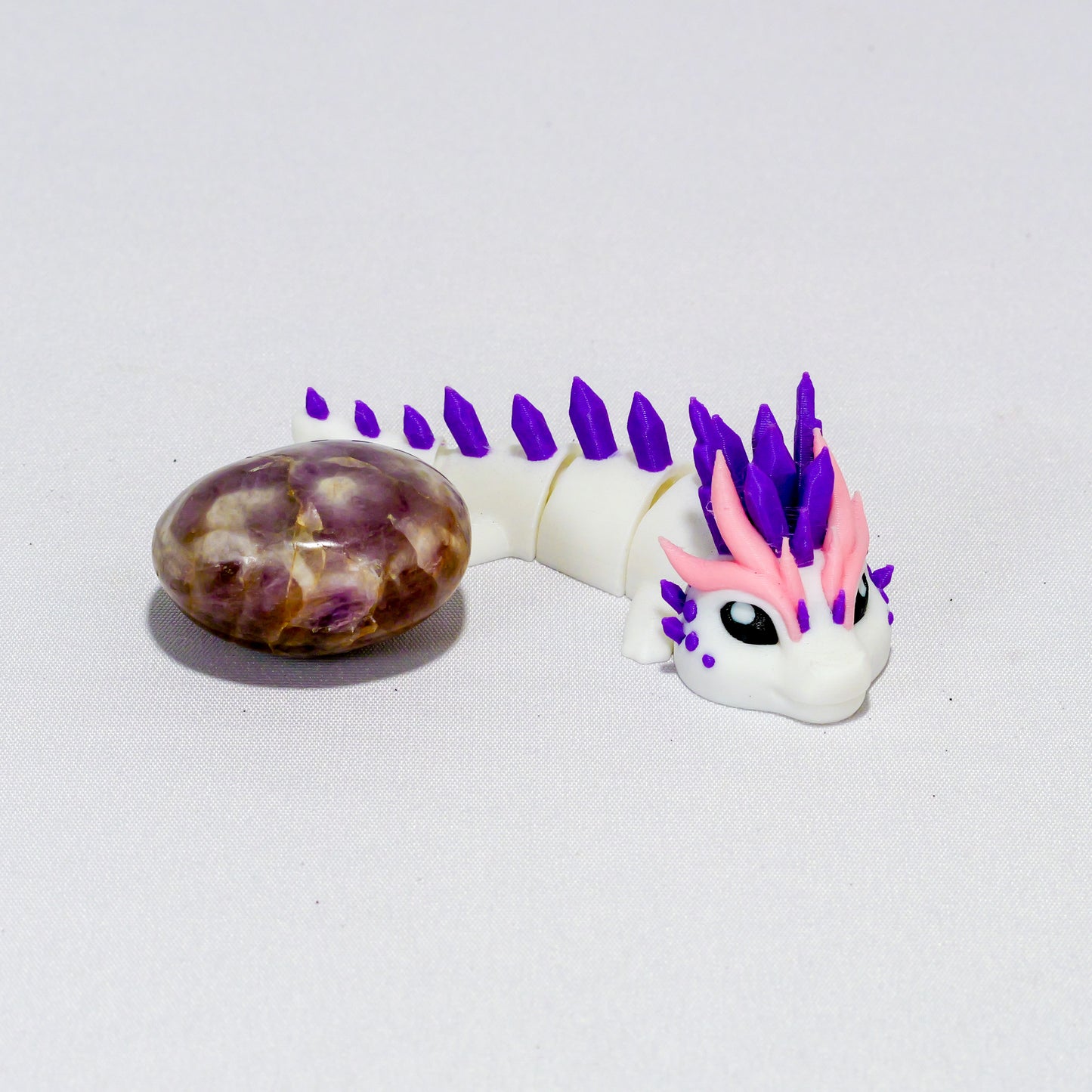 Bébé dragon de glace rose