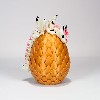 Dragon Fleuri dans son Oeuf Doré